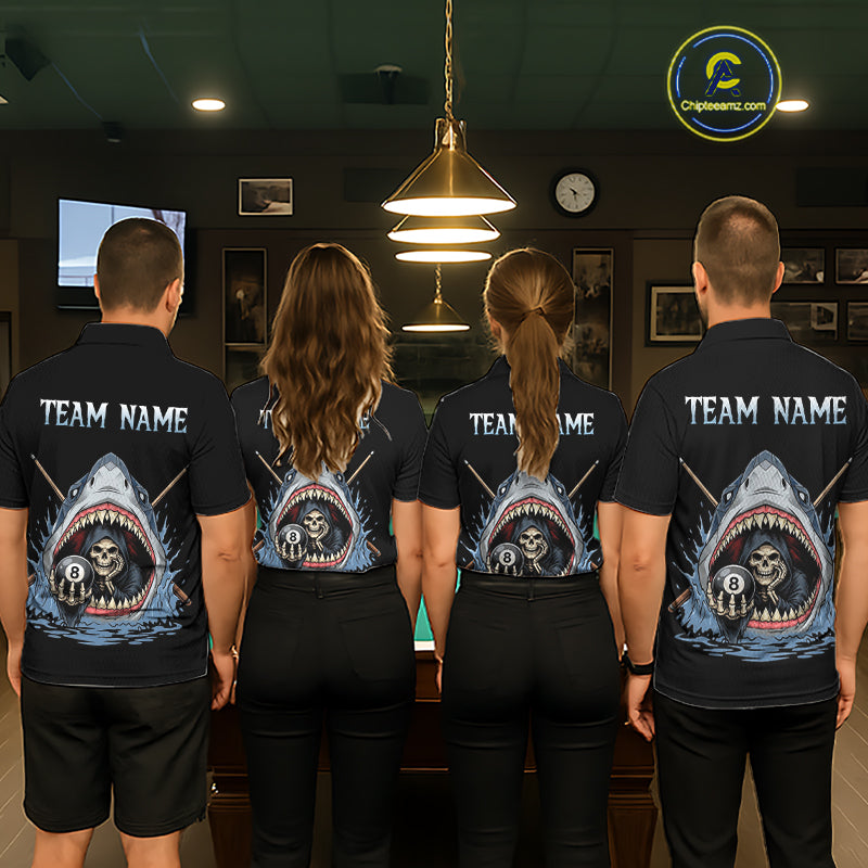 Four people wearing black t-shirts with a shark and skull design on the back, standing in a room with pool tables.