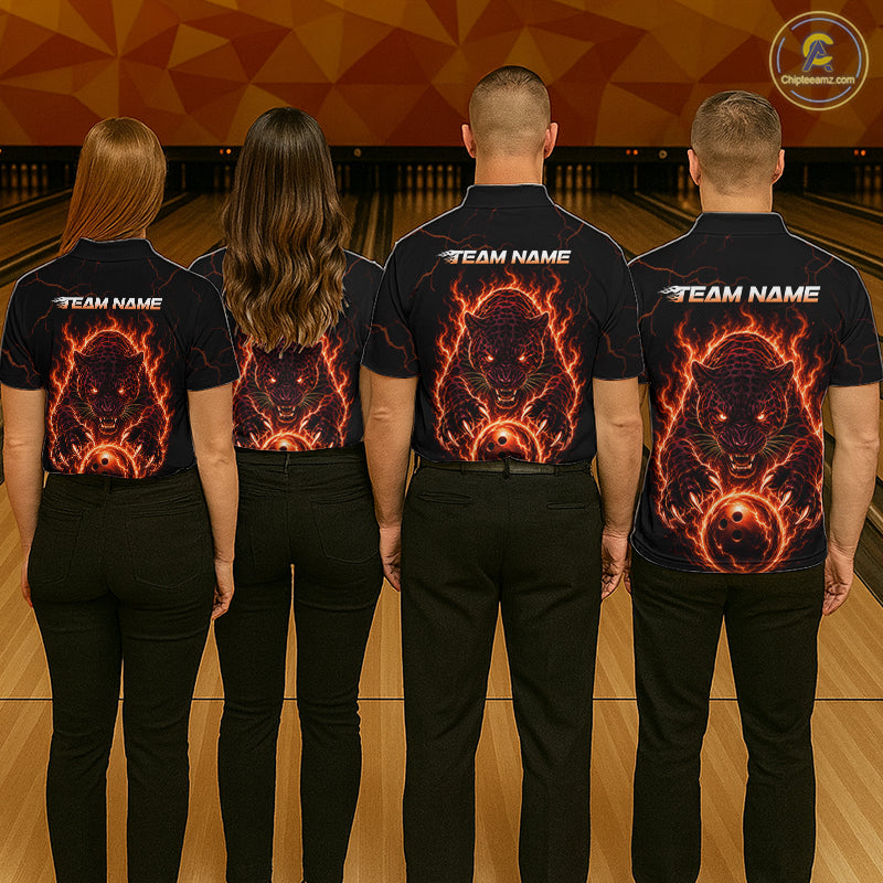 Four people wearing black shirts with a fiery pather design on a bowling alley background