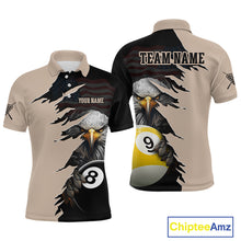 Load image into Gallery viewer, Front and back views of a beige and black billiards polo shirt featuring a fierce bald eagle emerging through a torn-rip graphic, with custom “TEAM NAME” and “YOUR NAME” text areas and 8-ball and 9-ball designs.
