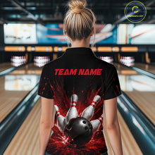 Load image into Gallery viewer, Woman wearing a black bowling polo shirt with dramatic red splatter graphics, a large black bowling ball, and flying pins, plus custom player name text.