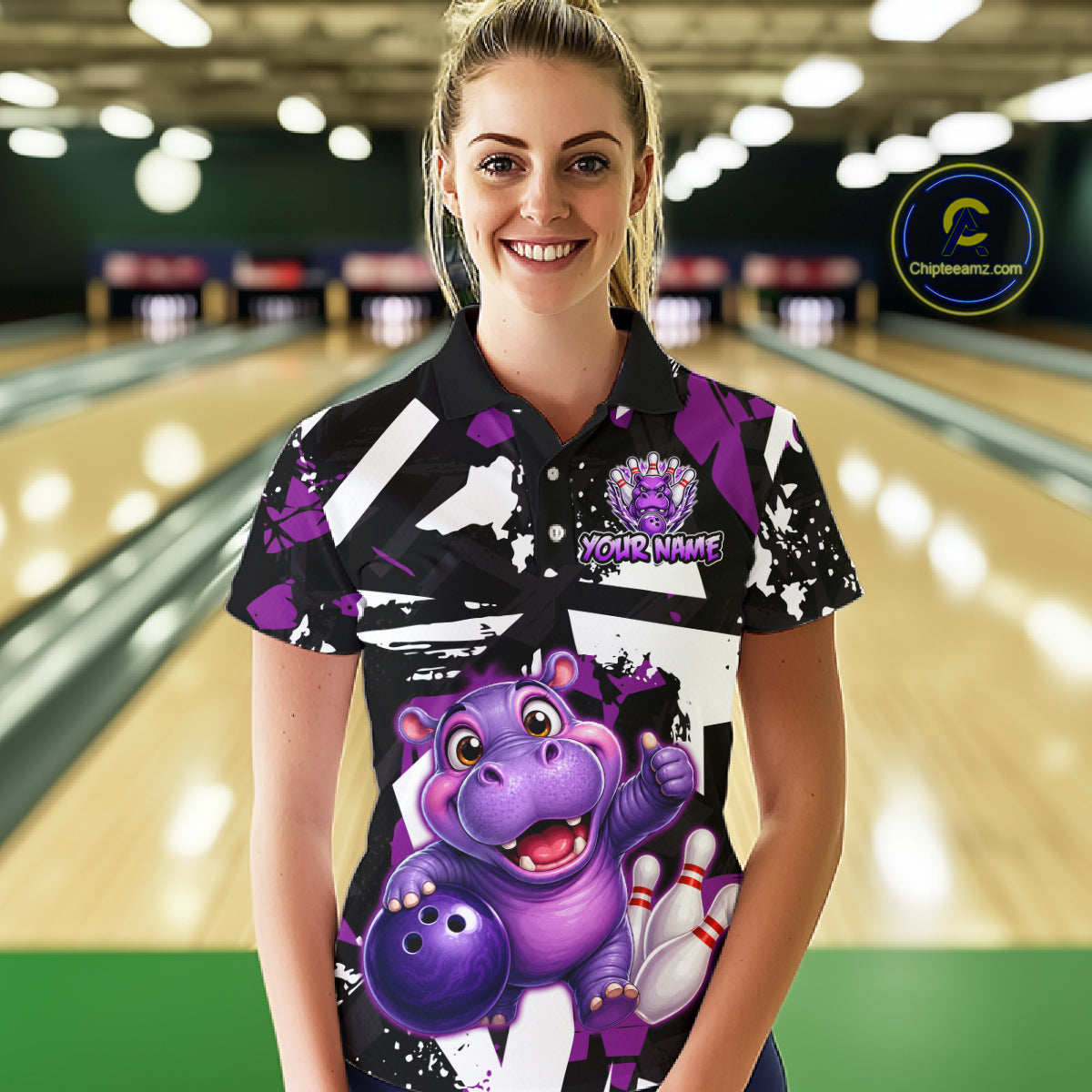 Woman wearing of a black, white, and purple bowling polo shirt featuring a cheerful purple hippo holding a bowling ball, with custom player name text.