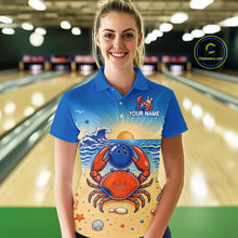 Load image into Gallery viewer, Person wearing a blue polo shirt with a crab design in a bowling alley.