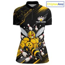 Load image into Gallery viewer, Front bowling quarter zip shirt featuring a muscular bee holding a bowling ball surrounded by pins on black yellow background.