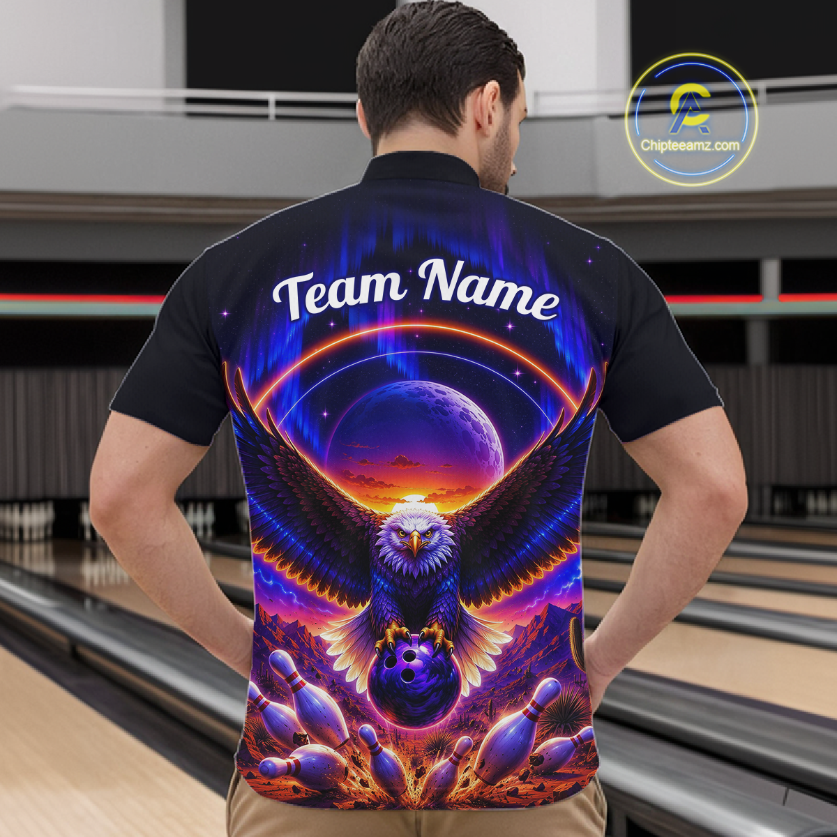 Man wearing a black bowling quarter zip with a eagle, glowing planet backdrop, bowling pins, and custom team and player name text.