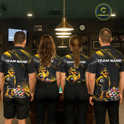 Four people wearing billiards polo shirt featuring a duck holding an eight ball with colorful pool balls arranged on a black yellow background.