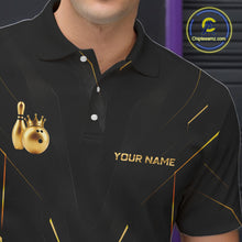Load image into Gallery viewer, Personalized bowling polo shirt with a crowned bowling ball accent paired with gold line patterns across a black layout.