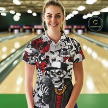 Load image into Gallery viewer, Woman wearing a colorful bowling shirt with a skull design in a bowling alley.