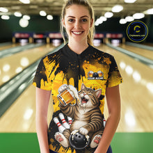 Load image into Gallery viewer, Person wearing a colorful bowling shirt with a cat design in a bowling alley.
