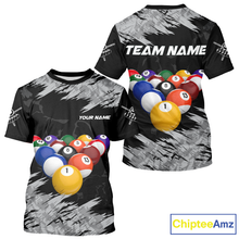 Load image into Gallery viewer, Two black t-shirts with colorful billiard ball design and customizable text on a white background.