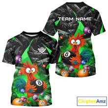 Load image into Gallery viewer, T-shirt with a colorful rooster design and billiard balls on a black and green abstract background, featuring 'ChipteeAmz' branding.