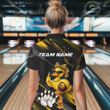 Load image into Gallery viewer, Person wearing a bowling shirt with a duck design and 'Team Name' text in a bowling alley.
