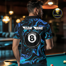 Load image into Gallery viewer, Back view of a woman wearing a black billiards polo with teal and turquoise marble swirls, “TEAM NAME” text, and a large 8-ball graphic.