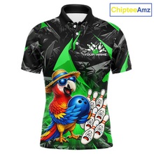 Load image into Gallery viewer, Colorful polo shirt with a parrot and bowling design on a green background, branded 'ChipteeAmz'.