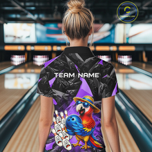 Load image into Gallery viewer, Person wearing a colorful bowling shirt with a parrot design in a bowling alley.