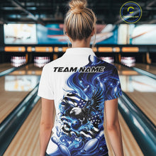 Load image into Gallery viewer, Back view female model at a bowling lane wearing a white and blue polo shirt with eagle graphics, bowling elements, and flowing flag inspired artwork.