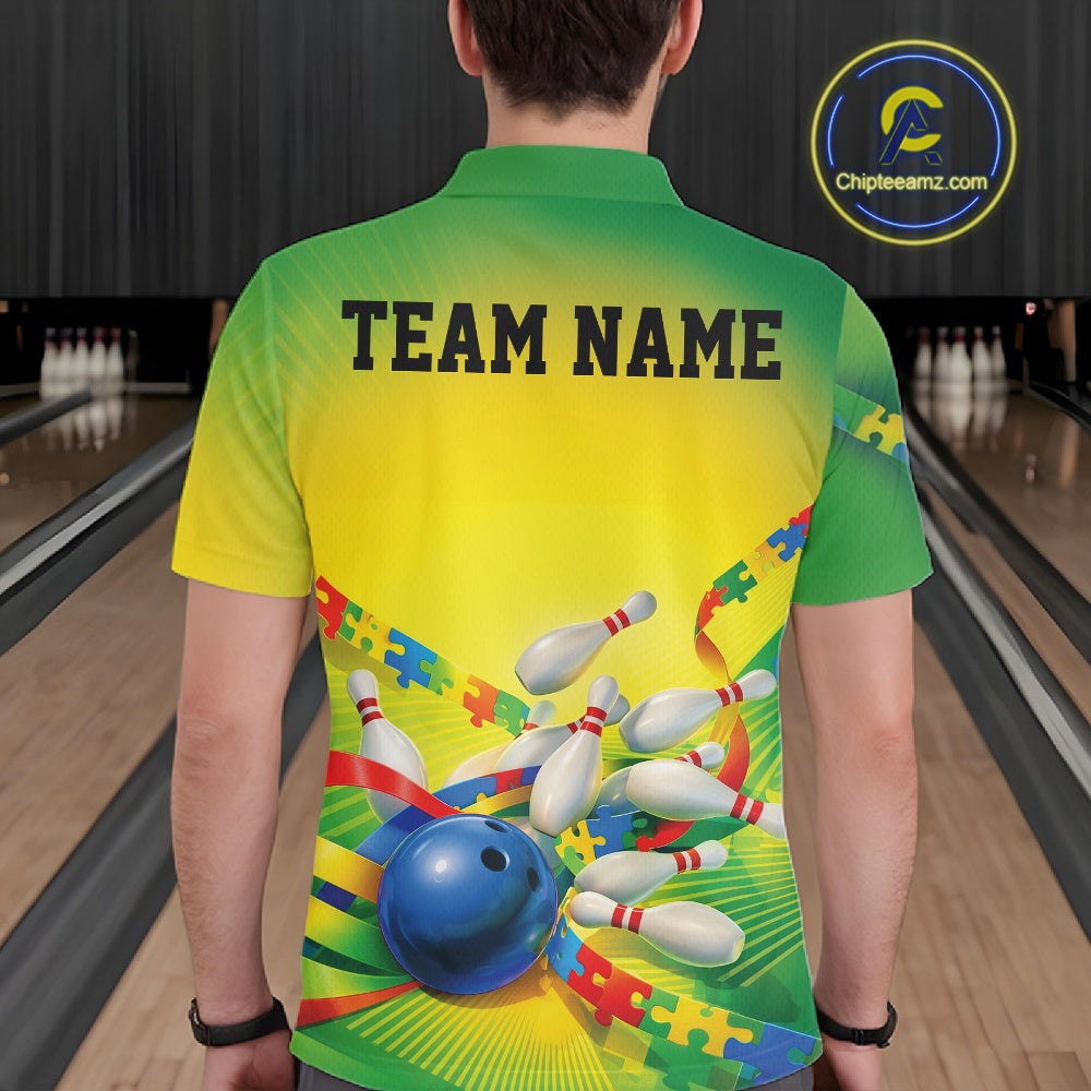 Male model at a bowling lane, back view of green and yellow polo shirt showcasing autism puzzle bowling ball and pins artwork