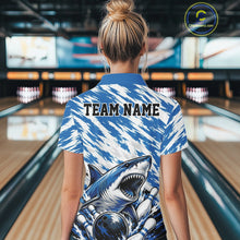 Load image into Gallery viewer, Person wearing a blue and white patterned shirt with a shark design in a bowling alley.