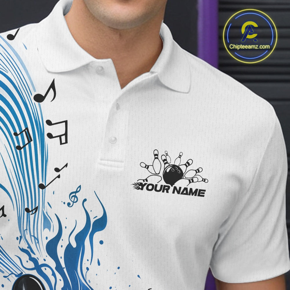 Close-up of the left chest on a white and blue bowling polo shirt featuring bowling graphics and flowing music note accents.