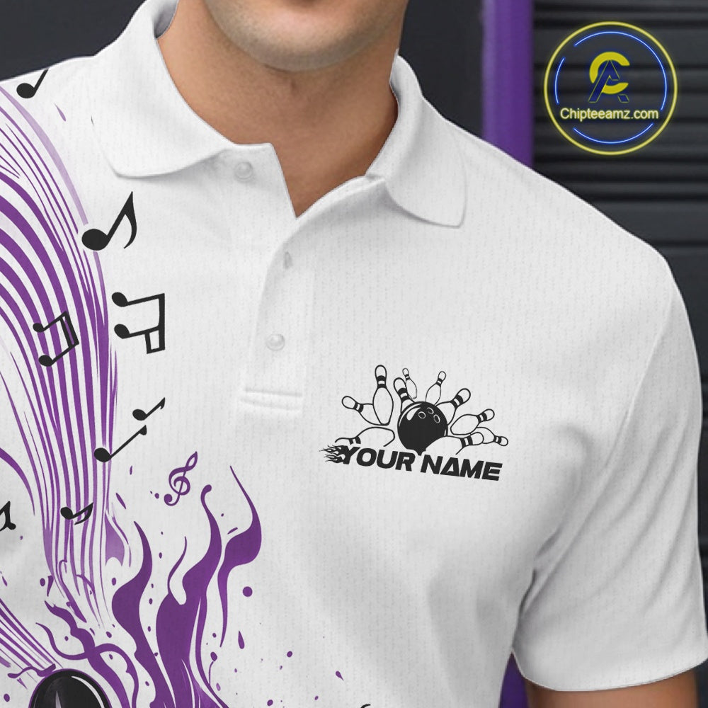 Left chest close-up of a white and purple bowling polo shirt showcasing bowling ball and pin graphics with musical wave accents.