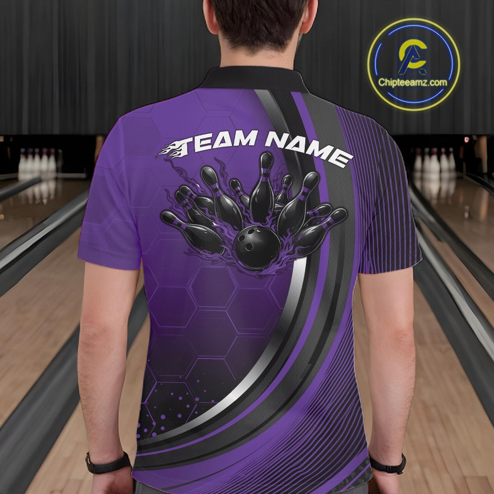 Back view of a male model in a bowling lane wearing a black and purple polo shirt, featuring a honeycomb pattern with a flaming bowling ball striking pins.