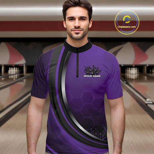 Male model in a bowling lane wearing a black and purple quarter zip shirt with honeycomb design and flaming bowling strike graphics.