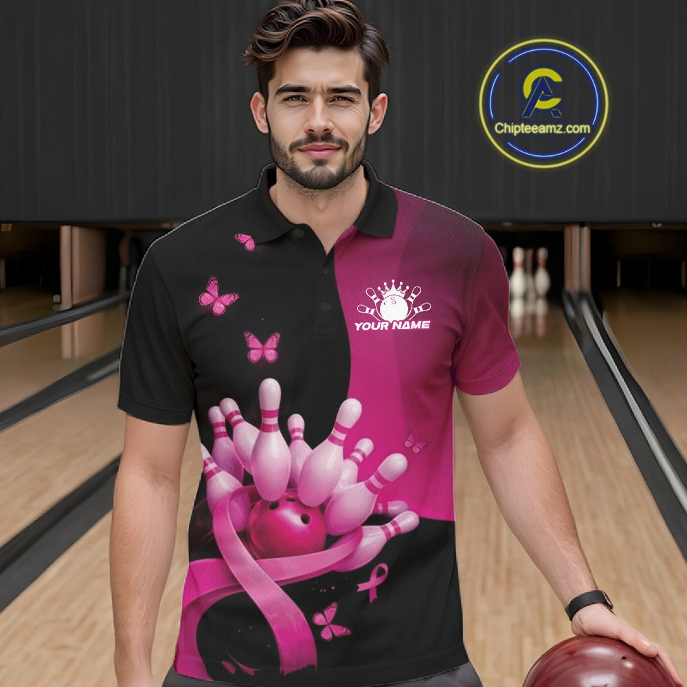 Male model in a bowling lane wearing a black and pink polo shirt with pink ribbon accents, butterflies, and bowling-themed graphics.