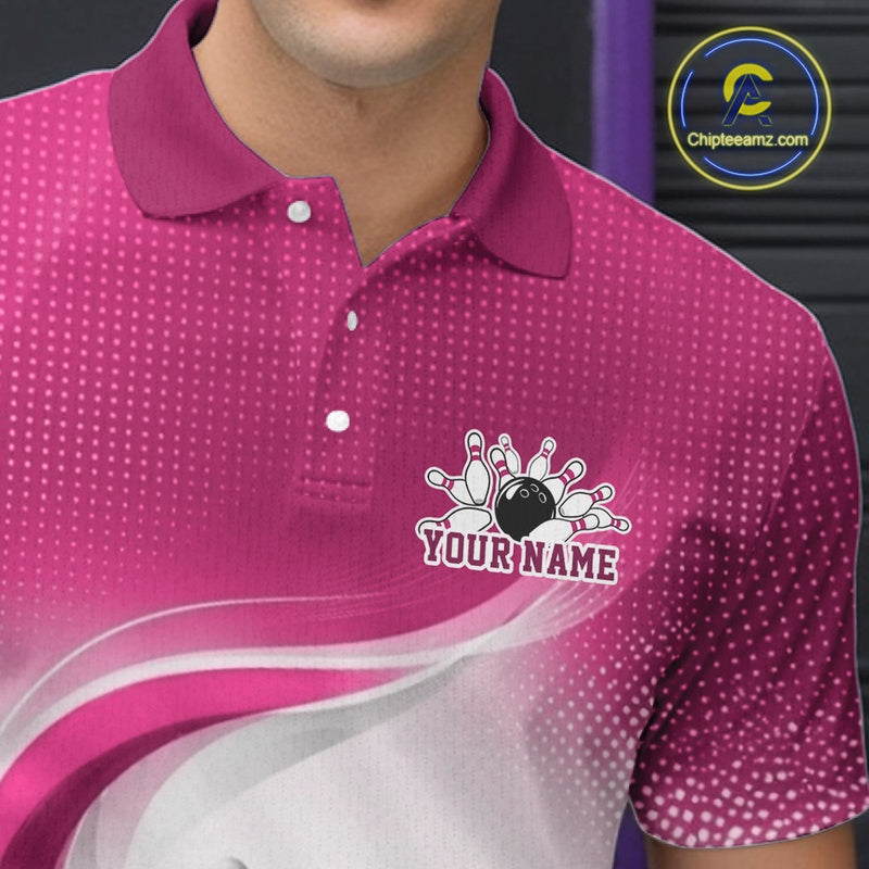 Close-up chest detail of a white and pink bowling polo shirt with sweeping linework and bowling-inspired artwork