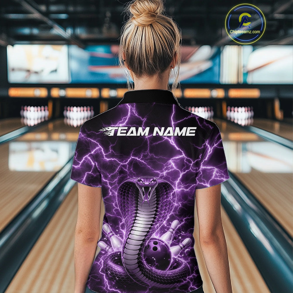 Back view of a womens bowling quarter-zip displaying a purple cobra and bowling ball graphic with lightning-inspired accents.