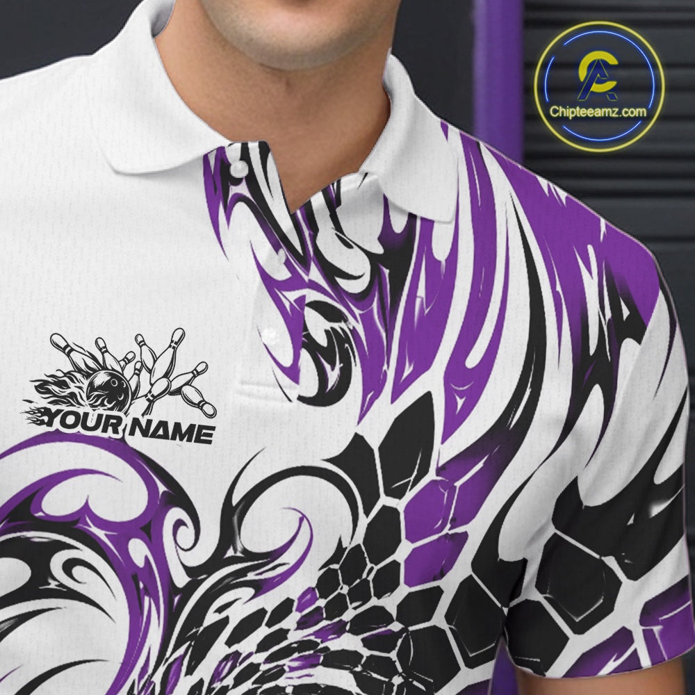 Close-up of the left chest area on a white bowling polo shirt with purple and black tribal graphics and a glossy red bowling strike design