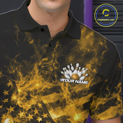 Left chest detail of a black and yellow bowling polo featuring a bowling ball crashing through pins with flames.