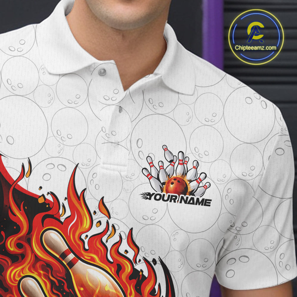 Close-up left chest detail of a white and red bowling polo with a fiery bowling action scene illustration.
