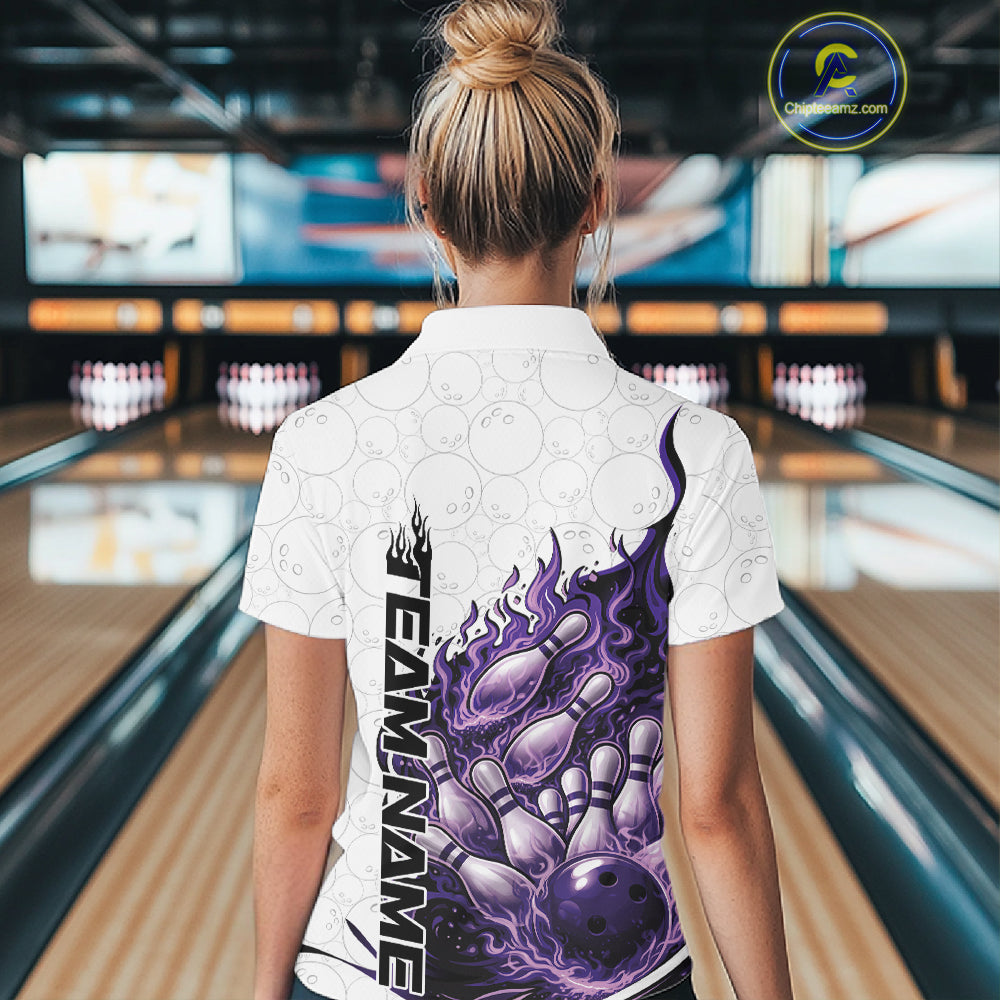 Back view female model in bowling lane wearing polo shirt with flaming bowling ball crashing into pins blue purple dynamic fire bowling design