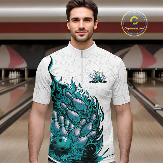Male model in bowling lane wearing quarter-zip shirt with flaming bowling ball crashing pins white green sports artwork