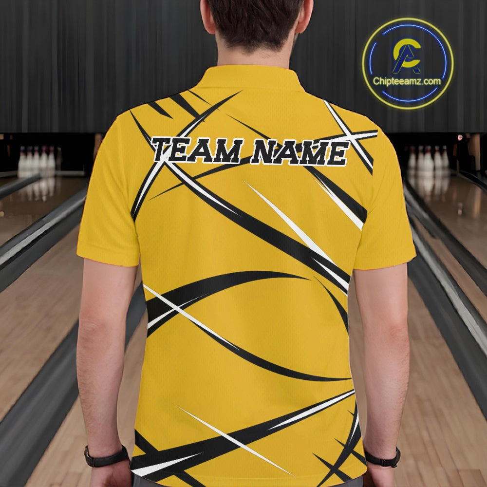 Back view of a male bowler wearing a yellow, black, and white bowling polo shirt in a bowling lane