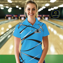 Load image into Gallery viewer, Front view of a female bowler in a bowling lane wearing a blue, black, and white bowling polo shirt with an athletic jersey pattern