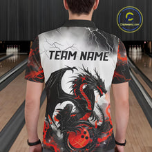Load image into Gallery viewer, Back view of a male model in a bowling alley wearing a custom bowling polo shirt featuring a red dragon and lightning strikes design.