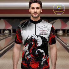 Load image into Gallery viewer, Front view of a male model in a bowling alley wearing a custom quarter-zip bowling shirt featuring a red dragon and lightning strikes design.