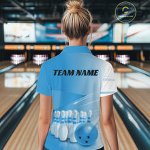 Load image into Gallery viewer, Back view of a female model in a bowling lane wearing a quarter zip shirt with bowling ball and pins arranged in a pink gradient pattern.