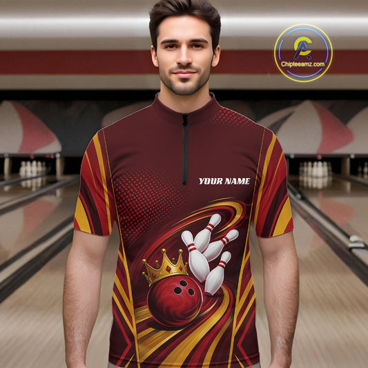 A man wearing a custom bowling-themed short-sleeve quarter-zip shirt with a red, yellow, and black graphic design featuring bowling pins, a bowling ball, and a crown, with 'YOUR NAME' printed on the chest. 