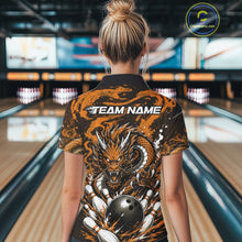Load image into Gallery viewer, Person wearing a bowling shirt with a dragon design in a bowling alley