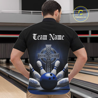Male model front view at bowling venue wearing black quarter zip shirt with blue Celtic cross and bowling ball impact graphic in action scene