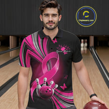 Load image into Gallery viewer, Front view of a male model in a black and pink bowling polo with breast cancer awareness ribbons, small butterflies, and bowling artwork