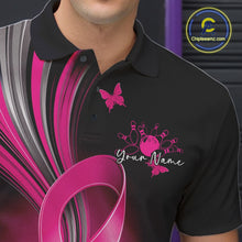 Load image into Gallery viewer, Close-up left chest view of a black and pink bowling polo featuring breast cancer awareness ribbons, small butterflies, and bowling graphics