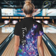 Load image into Gallery viewer, Back view of a female model wearing a black bowling polo with starry galaxy graphics, glowing neon swirls, and hologram butterflies