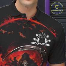Load image into Gallery viewer, Close-up of the left chest on a black and red bowling polo shirt featuring a grim reaper commanding a blazing bowling ball crashing into scattered pins through swirling flames.