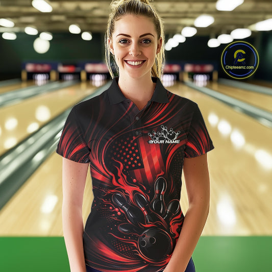 Female model at a bowling lane wearing a black and red bowling polo shirt with patriotic bowling action graphics and bold flame details.