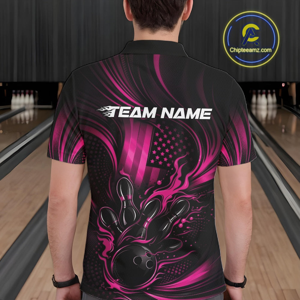 Back view of a male model in a bowling center wearing a black and pink polo featuring flaming bowling ball and pins design.