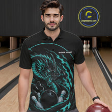 Load image into Gallery viewer, Front view of a male model in a bowling alley wearing a blue custom bowling polo shirt featuring an aggressive dragon with flames in a dynamic and energetic design.