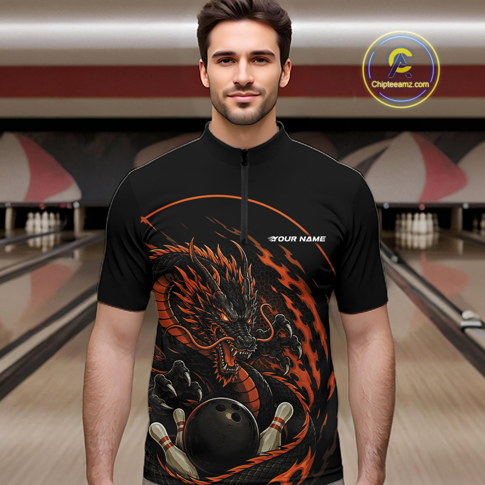 Front view of a male model in a bowling alley wearing an orange custom quarter-zip bowling shirt featuring an aggressive dragon with flames in a dynamic and energetic design.