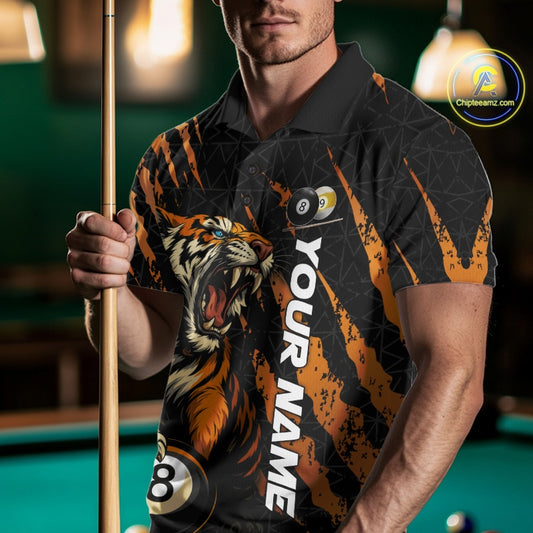 Male model front view wearing a Billiard polo shirt with roaring tiger artwork, orange claw marks, and billiard balls.